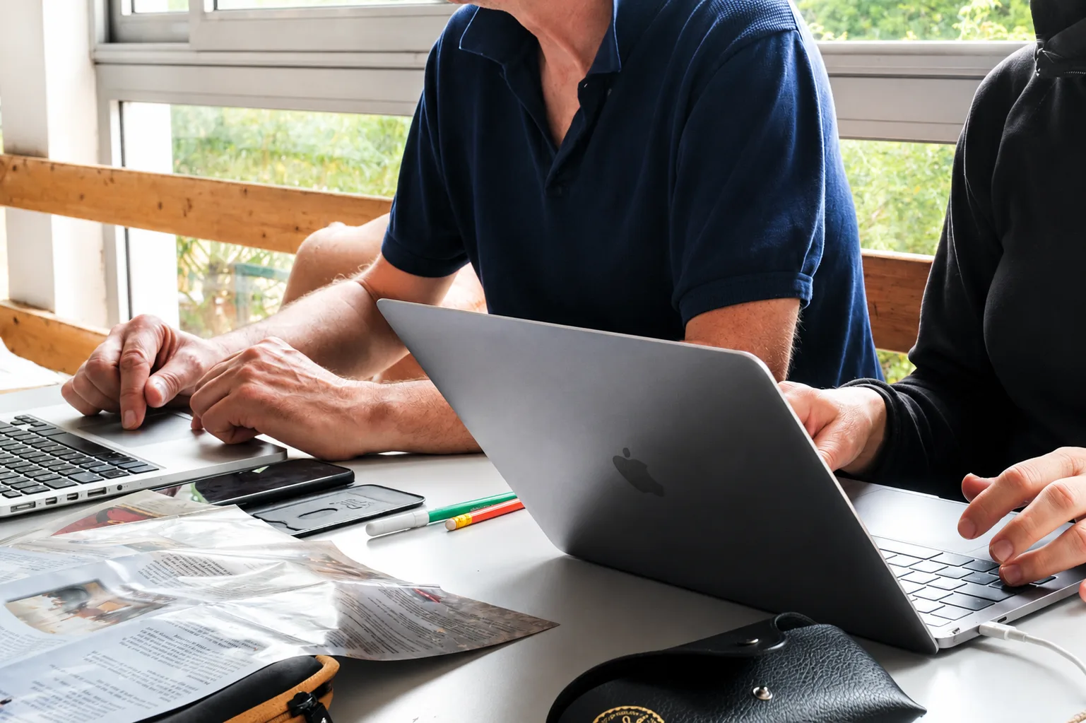 Volunteers with the non-profit toiling to enter calendar dates by hand across three language editions of the InDesign planning
